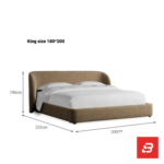 Wrapped-wing upholstered platform bed in caramel bouclé fabric with curved sides by Bahoo Furniture UAE
