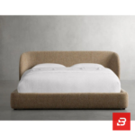 Wrapped-wing upholstered platform bed in caramel bouclé fabric with curved sides by Bahoo Furniture UAE
