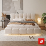 Puff-quilted upholstered platform bed in cream velvet fabric with square tufted segments by Bahoo Furniture UAE