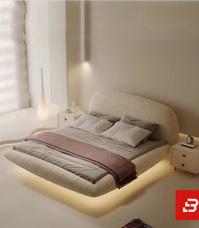 Floating-base upholstered platform bed in beige bouclé fabric with integrated under-bed lighting by Bahoo Furniture UAE