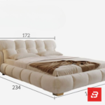 Pillow-top channel upholstered platform bed in ivory white velvet fabric with segmented plump backrest by Bahoo Furniture UAE