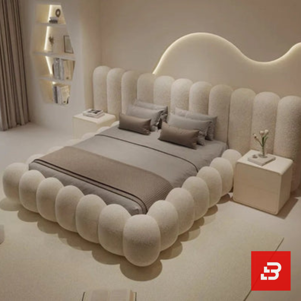 Sculptural bubble upholstered platform bed in cream bouclé fabric with rounded vertical bubble cushioning by Bahoo Furniture UAE