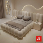Sculptural bubble upholstered platform bed in cream bouclé fabric with rounded vertical bubble cushioning by Bahoo Furniture UAE
