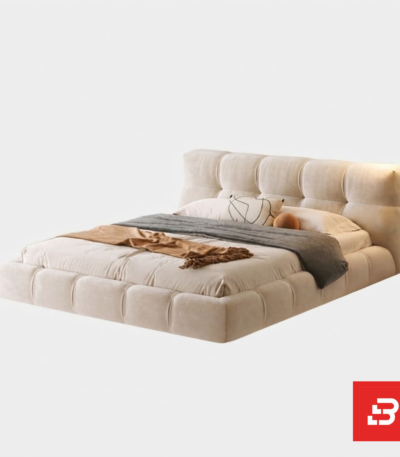 Puff-quilted upholstered platform bed in cream velvet fabric with square tufted segments by Bahoo Furniture UAE