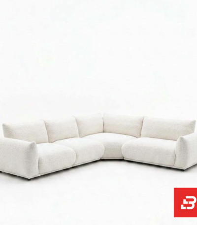 Studio product view of a luxury upholstered modular l-shape sectional sofa in off white bouclé fabric featuring deep plush cushions and wide padded armrests by Bahoo Furniture UAE