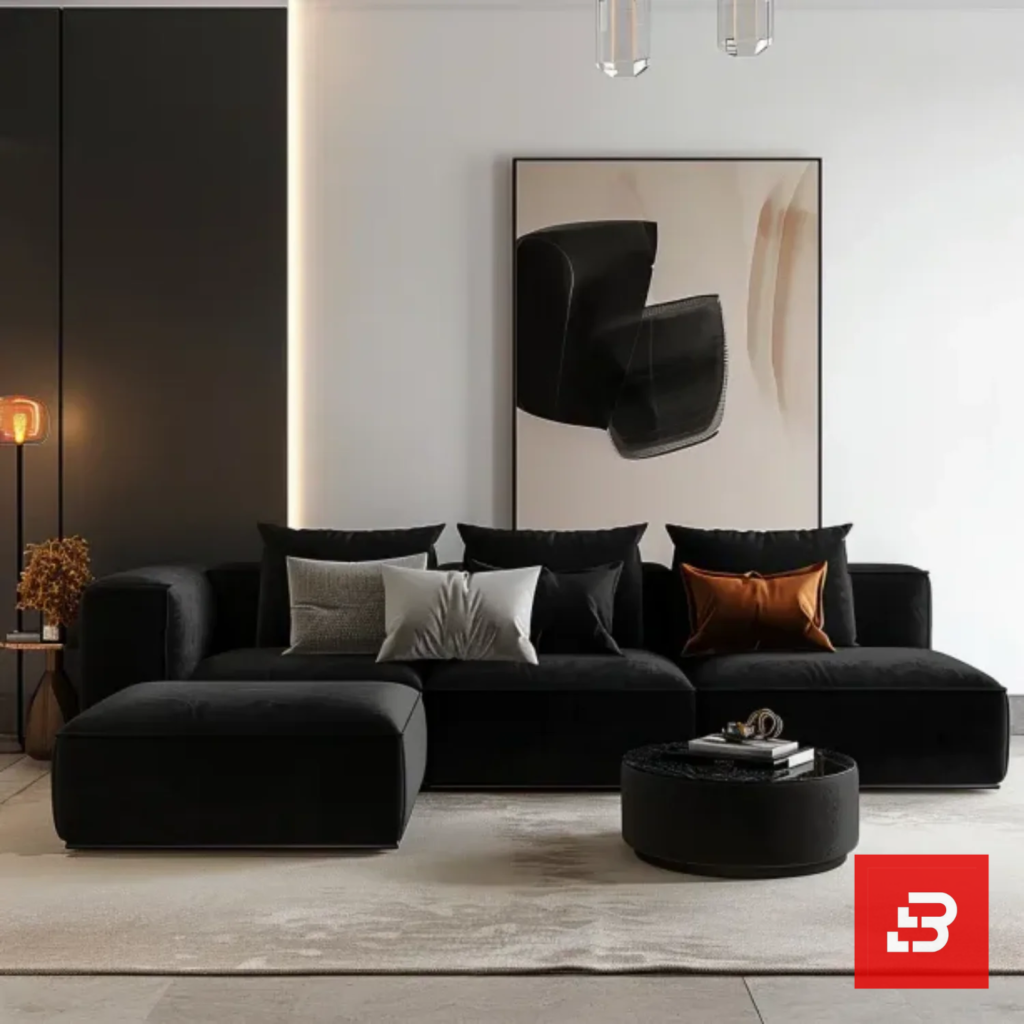 Contemporary interior view of a luxury upholstered modular chaise sectional sofa in warm gray velvet fabric featuring a matching ottoman and accent pillows against a modern wall art backdrop by Bahoo Furniture UAE