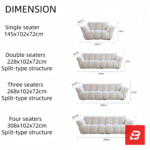Sunlit minimal modern apartment living room interior view of a luxury channel tufted sofa upholstered in textured off white bouclé fabric featuring structured vertical channel tufting and flared cushioned armrests by Bahoo Furniture UAE