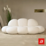 Minimalist modern interior view of a luxury cloud bubble sofa upholstered in textured off white bouclé fabric featuring rounded organic modular lobes and a low-profile silhouette by Bahoo Furniture UAE