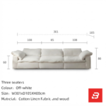 Bright warm modern living room interior showcasing a luxury cloud sofa upholstered in textured off white bouclé fabric with ultra-plush feather down-blend cushions and angled bolster pillows by Bahoo Furniture UAE