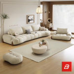 Bright warm modern living room interior showcasing a luxury plissé sectional sofa set upholstered in textured beige bouclé fabric featuring horizontal channel tufting and wooden feet accents by Bahoo Furniture UAEBright warm modern living room interior showcasing a luxury plissé sectional sofa set upholstered in textured beige bouclé fabric featuring horizontal channel tufting and wooden feet accents by Bahoo Furniture UAE