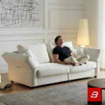 Warm elegant living room interior view of a luxury plump cushion sofa upholstered in textured off white bouclé fabric featuring deep plush back pillows and angled armrests by Bahoo Furniture UAE