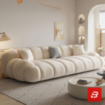 Bright modern sunlit living room interior view of a luxury channel modular lounge set upholstered in textured off white bouclé fabric featuring horizontal ribbed modules, an armchair, and an ottoman by Bahoo Furniture UAE