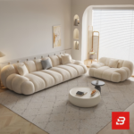 Bright modern sunlit living room interior view of a luxury channel modular lounge set upholstered in textured off white bouclé fabric featuring horizontal ribbed modules, an armchair, and an ottoman by Bahoo Furniture UAE