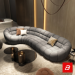 Luxurious open-concept modern living room interior showcasing a magnificent curved channel sectional sofa upholstered in textured beige bouclé fabric featuring segmented pillowy modules and warm throw pillows by Bahoo Furniture UAE