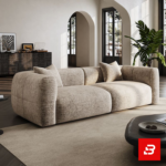 Sunlit luxury living room interior showcasing a spacious deep-seat sofa upholstered in textured warm gray bouclé fabric featuring wide track arms, plush back cushions, and accent pillows by Bahoo Furniture UAE