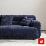 Modern minimalist living room interior showcasing a luxury modular sofa upholstered in deep warm gray bouclé fabric featuring low-profile cushions and matching wooden coffee tables by Bahoo Furniture UAE