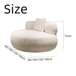 Bright modern room interior showcasing a luxury round accent chair upholstered in soft off white bouclé fabric featuring cylindrical armrests and a matching throw pillow by Bahoo Furniture UAE
