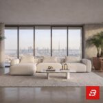 Elegant high-rise living room view of a luxury upholstered modern low-profile sectional sofa in off white bouclé fabric featuring a chaise lounge against a panoramic skyline window by Bahoo Furniture UAE
