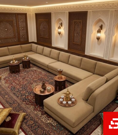 Heritage majlis upholstered sectional sofa in sand beige velvet fabric arranged in a traditional Arabic layout by Bahoo Furniture UAE