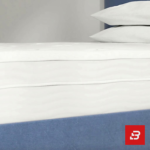 Tailored high-back upholstered platform bed in dusty blue velvet by Bahoo Furniture UAE