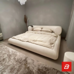 Pillow-bolster modern platform bed in pure ivory bouclé fabric by Bahoo Furniture UAE