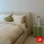 Curved wingback upholstered platform bed in cream bouclé fabric by Bahoo Furniture UAE
