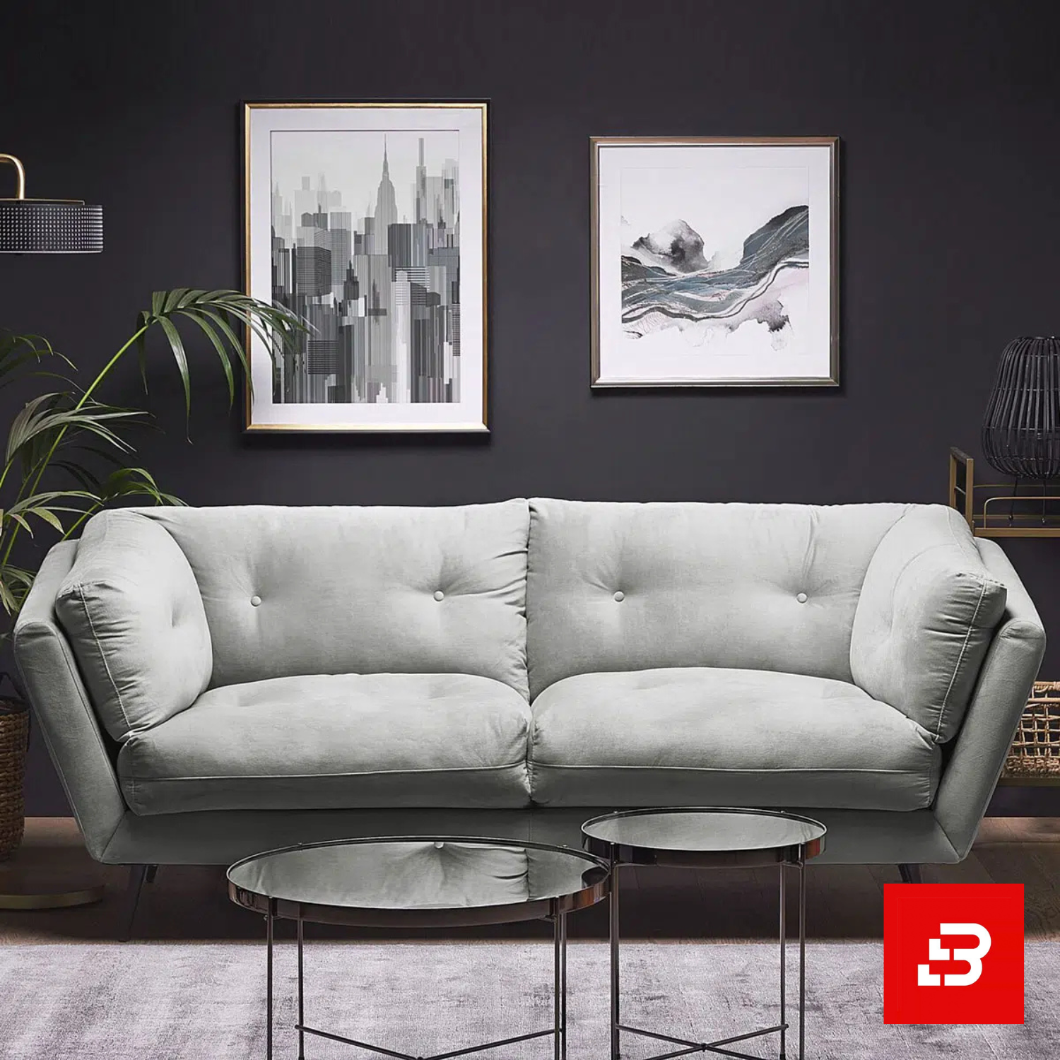 Bahoo Luxury Tufted Sofa Upholstered - Bahoo Furniture Sophisticated dark-walled modern living room interior showcasing a luxury tufted sofa upholstered in soft warm gray velvet fabric featuring button tufting and angled arms by Bahoo Furniture UAE