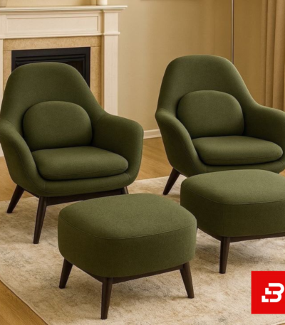 Modern elegant interior featuring a pair of warm gray fabric accent armchairs with matching footrest ottomans on dark wood legs by Bahoo Furniture UAE