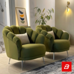 Elegant modern lounge setting showcasing plush scalloped shell-back accent armchairs with sleek metallic legs by Bahoo Furniture UAE