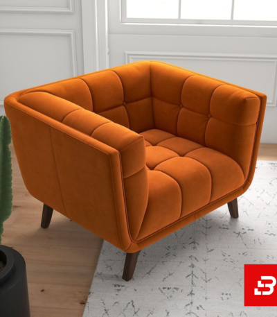 Modern bright interior space featuring a luxury warm gray velvet grid-tufted cube armchair with dark wooden legs on a textured carpet by Bahoo Furniture UAE