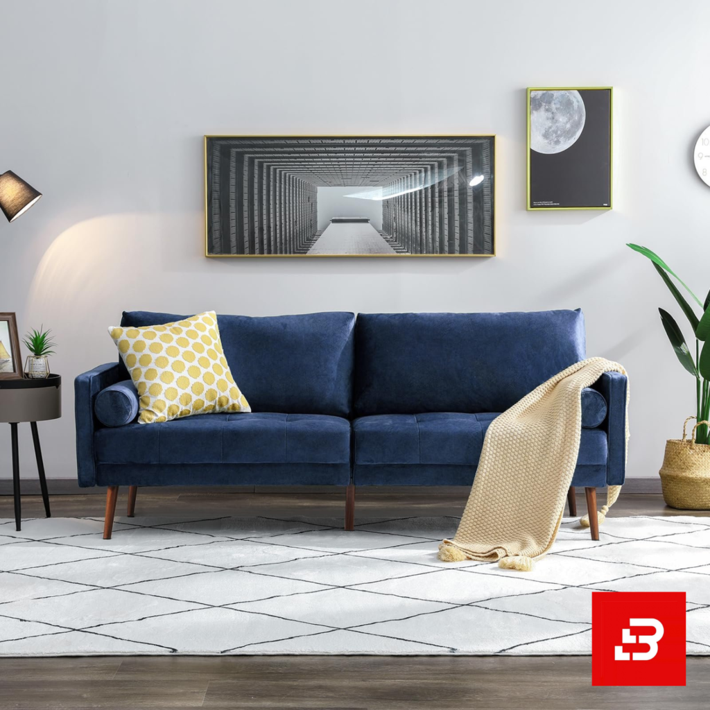 Modern minimalist living room interior showcasing a luxury cloud sofa upholstered in soft off white velvet fabric featuring plush cushions and bolster pillows by Bahoo Furniture UAE