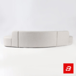 Minimalist studio setting showcasing a sleek organic curved sofa upholstered in soft off white bouclé fabric against a clean white background by Bahoo Furniture UAE