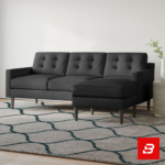 Modern minimalist living room featuring a tufted warm gray fabric l-shape sectional sofa with button details, wooden tapered legs, and a patterned rug by Bahoo Furniture UAE
