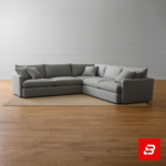 Minimalist living room featuring a warm gray fabric l-shape sectional sofa with plush cushions on a woven rug over wooden flooring by Bahoo Furniture UAE