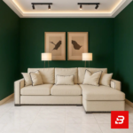Elegant living room interior with deep green walls showcasing a beige fabric l-shape sectional sofa with contrast piping trim, matching scatter cushions, and framed artwork by Bahoo Furniture UAE