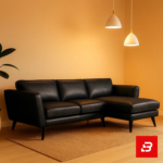 Warmly lit modern living room interior showcasing a gray leatherette l-shape sectional sofa with slender dark wooden legs, hanging pendant lights, and indoor plant by Bahoo Furniture UAE
