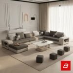 Grand modern luxury living room interior showcasing an expansive u-shape sectional sofa upholstered in soft warm gray and off white fabric featuring integrated armrest storage and matching stools by Bahoo Furniture UAE