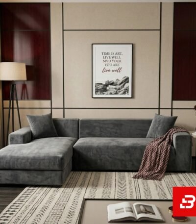 Sophisticated modern living room interior showcasing a luxury l-shape sectional sofa upholstered in soft warm gray velvet featuring matching throw pillows and a patterned throw blanket by Bahoo Furniture UAE