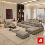 Elegant modern luxury living room interior showcasing a spacious contemporary sectional sofa with an attached chaise lounge upholstered in soft warm gray fabric with matching orange accent cushions by Bahoo Furniture UAE
